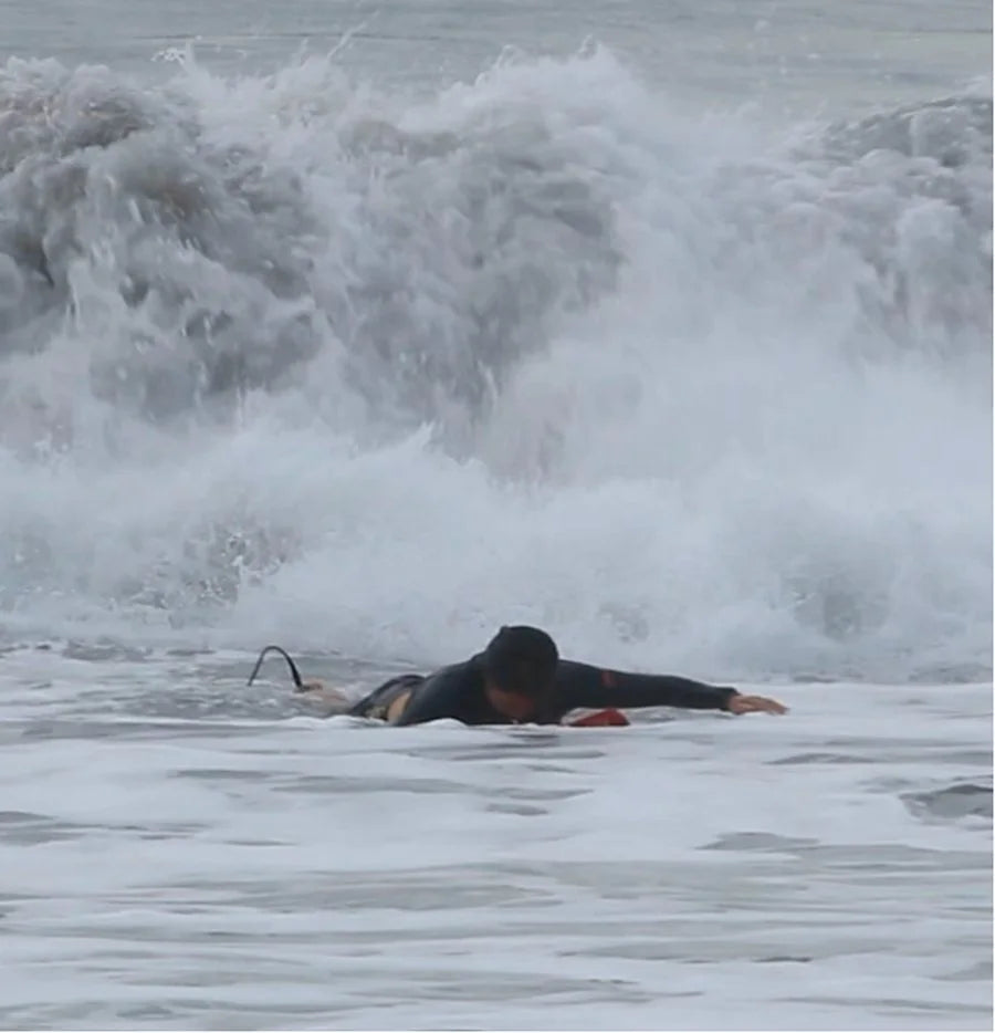 Van paddling into whitewater, getting worked