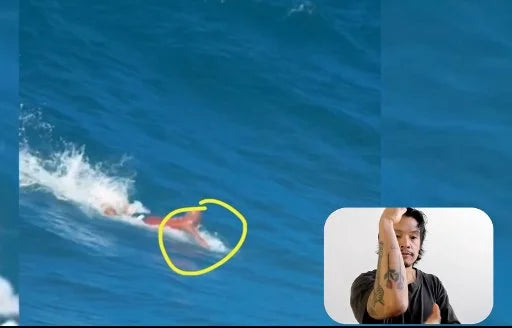 Van reviewing a surfer's paddling footage with the hand entry circled